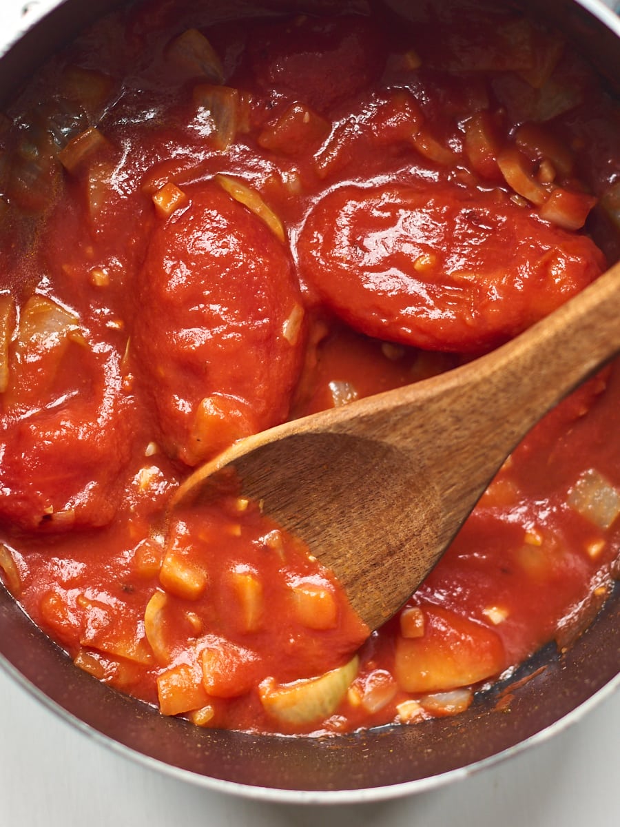 Tomatoes cooking in pan