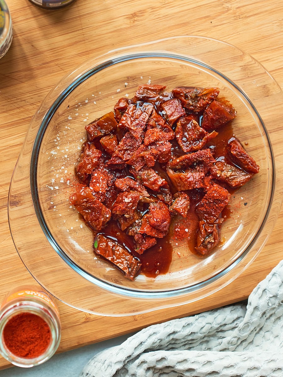 sundried tomatoes in a dish with marinade