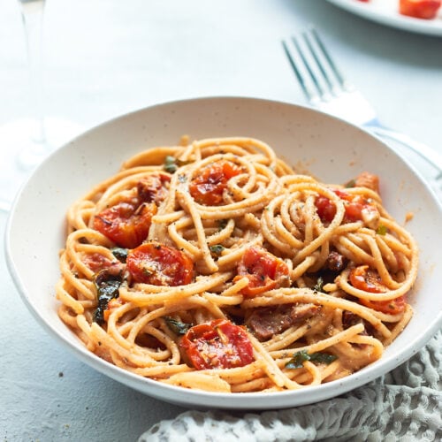 Tomato Spaghetti carbonara in bowl with wine 3