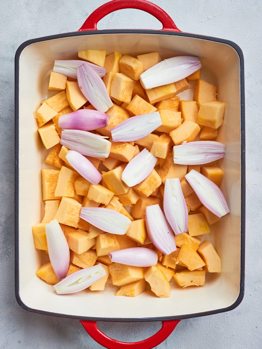 Pumpkin and shallots in casserole dish