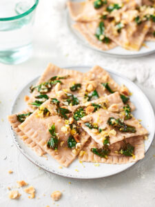 2 Plates of vegan butternut squash ravioli