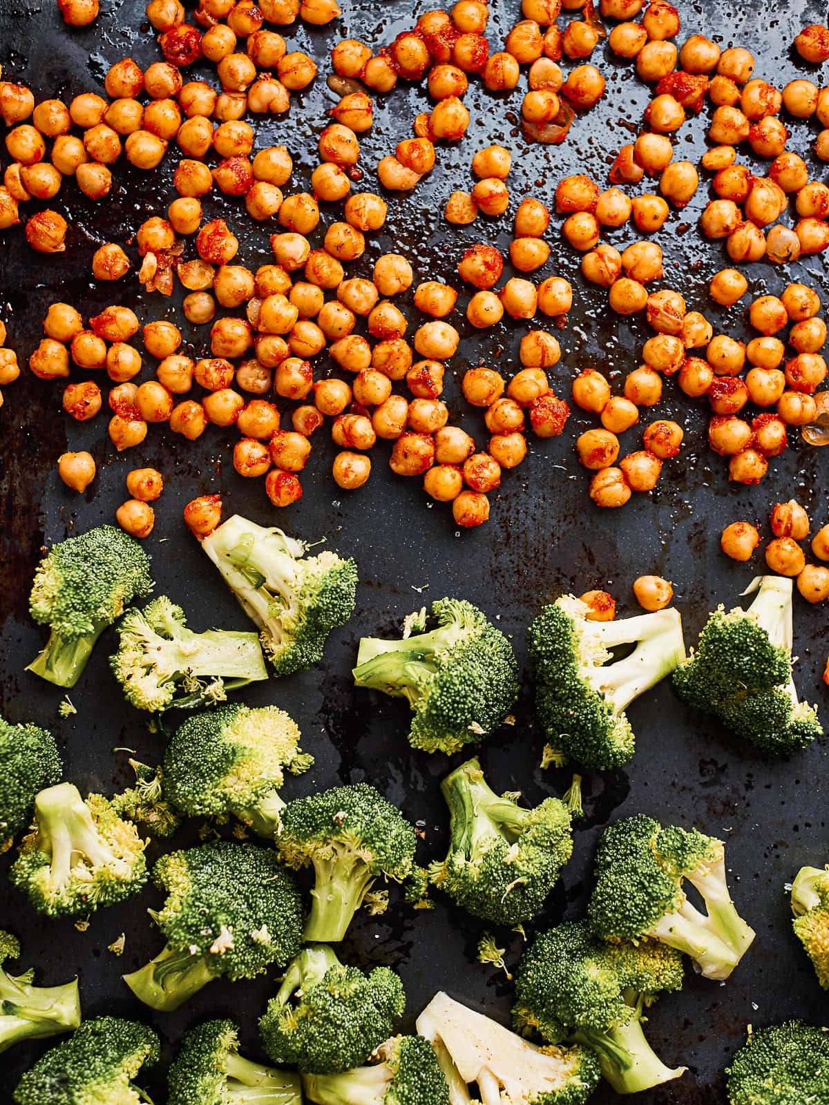 Broccoli and chickpeas on a baking sheet