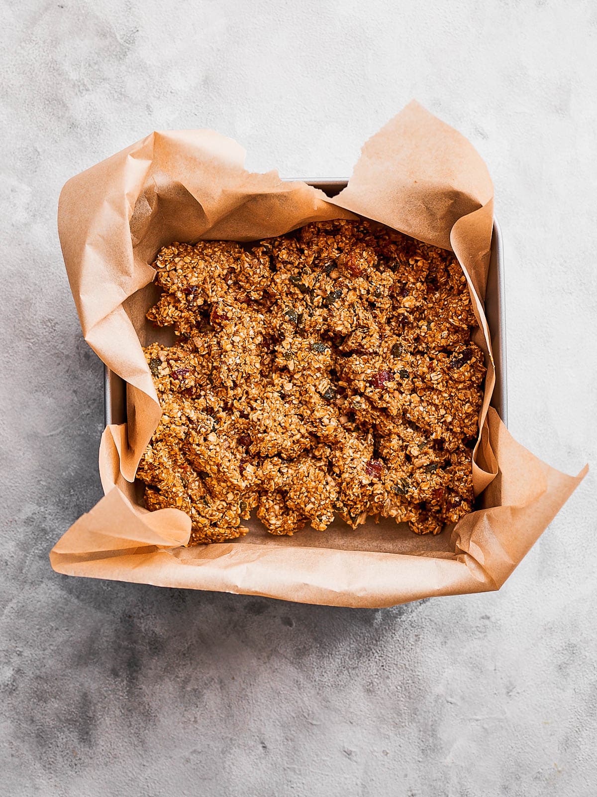 Date flapjack mix in the baking tin